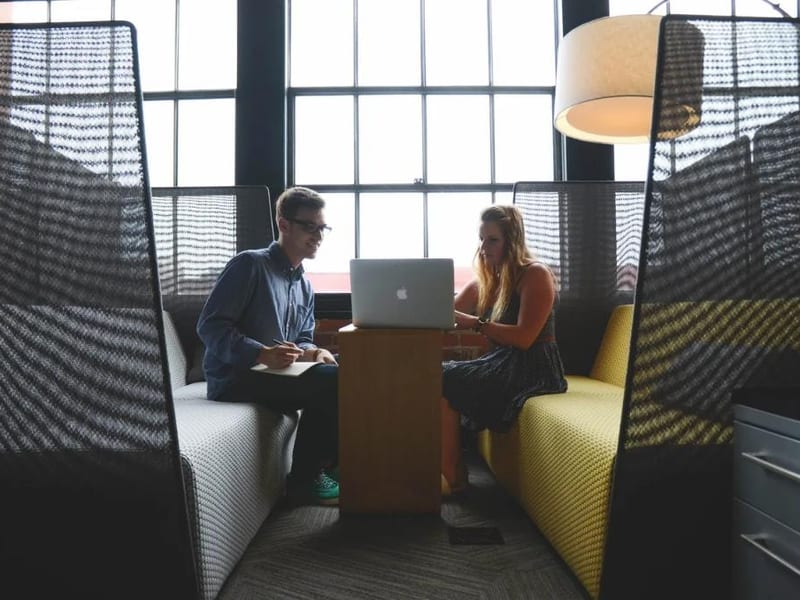 Diverse professional consulting team collaborating in a modern office